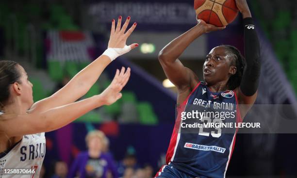 Serbia's Jovana Nogic and Britain's Sydney Wallace fight for the ball during a basketball game between Serbia and Great-Britain, in Ljubljana,...