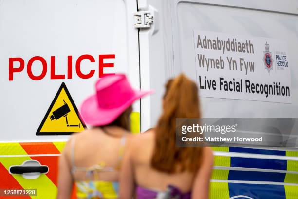 Police facial recognition cameras in operation on Westgate Street ahead of a Harry Styles concert at the Principality Stadium on June 20, 2023 in...