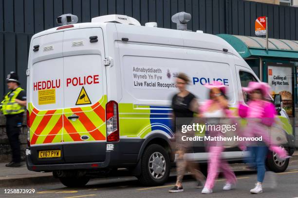 Police facial recognition cameras in operation on Westgate Street ahead of a Harry Styles concert at the Principality Stadium on June 20, 2023 in...