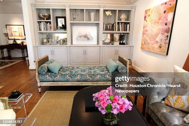 An antique day bed in the living room at the home of Shelley Calton, an eclectic bungalow in Southhampton, Wednesday, July 31 in Houston.