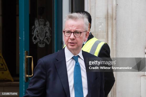Secretary of State for Levelling Up, Housing and Communities, Minister for Intergovernmental Relations Michael Gove leaves through the Cabinet Office...