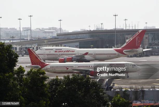 Air India aircrafts are seen at Chhatrapati Shivaji Maharaj International airport in Mumbai, India, 20 June, 2023. The Tata group-owned carrier...