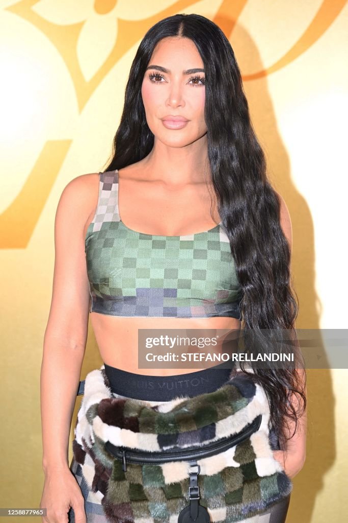 US socialite Kim Kardashian poses for a photocall at the Louis... News ...
