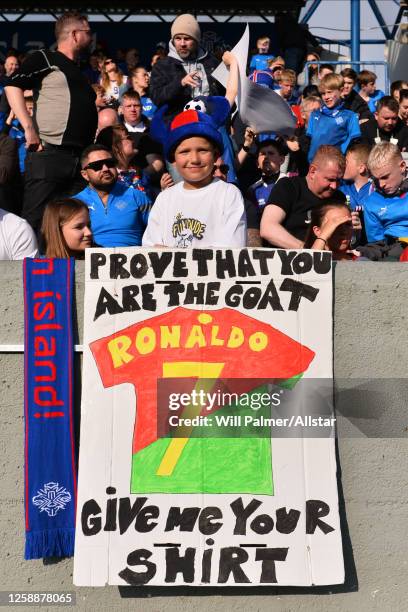 Iceland fan with sign asking for Cristiano Ronaldo's shirt during the UEFA EURO 2024 Qualifying Round Group J match between Iceland and Portugal at...