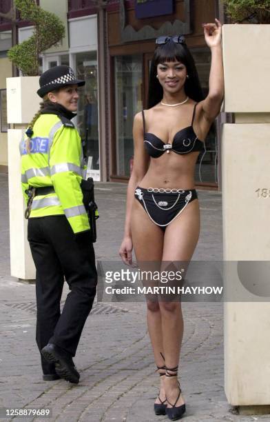 Susan Sangster , a Naomi Campbell lookalike, models a diamond encrusted bikini, possible the most expensive in the world, prior to taking her place...