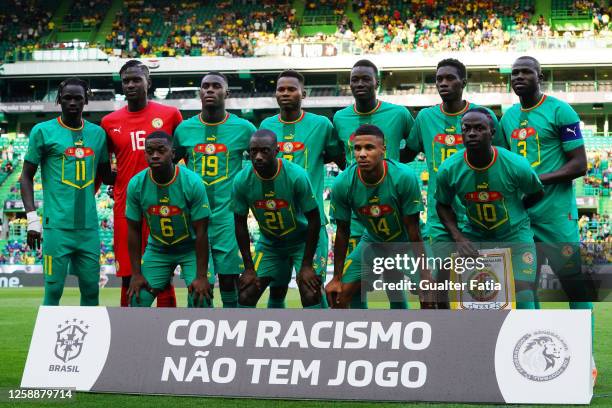 Senegal players pose for a team photo before the start of the International Friendly match between Brazil and Senegal at Estadio Jose Alvalade on...