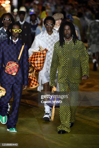 Models on the runway at the Louis Vuitton Menswear Collection Fashion Show on June 20, 2023 in Paris, France.