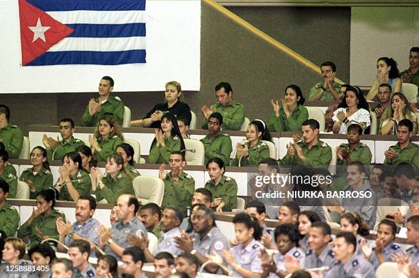 Members of the National Police applaud during a gathering at the Convention Center in Havana, Cuba 18 February 2000. The Minister of the Interior,...