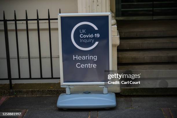 Sign is displayed outside the Covid-19 inquiry on June 19, 2023 in London, England. The UK Covid-19 Inquiry is examining the UK's response to and...