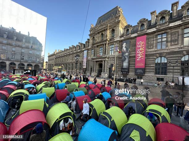 Homeless immigrants set up tents to protest on World Refugee Day in Paris, France on June 20, 2023. The French police dispersed the protest held for...