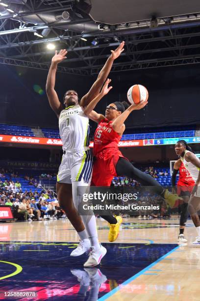 Allisha Gray of the Atlanta Dream drives to the basket during the game against the Dallas Wings on June 20, 2023 at the College Park Center in...