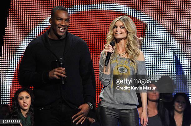 Player Antonio Gates and model Marisa Miller speak onstage during VH1's Pepsi Super Bowl Fan Jam at Verizon Theater on February 3, 2011 in Grand...