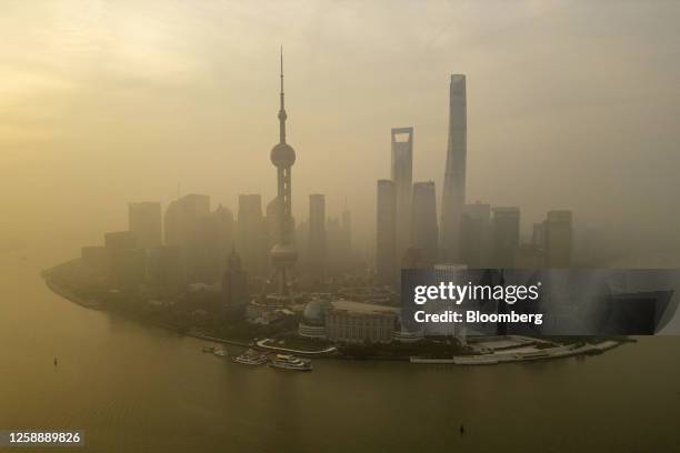 Buildings in Pudong's Lujiazui Financial District in Shanghai, China, on Wednesday, June 21, 2023. China's yuan weakened past the closely watched...