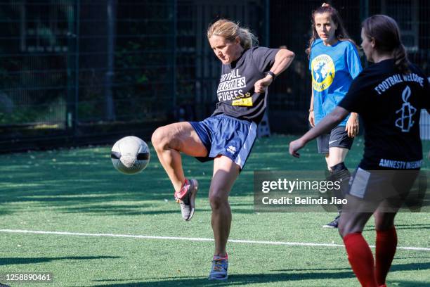Kim Leadbeater, MP for Batler and Spen in Yorkshire plays in the football match between Afghan Refugee Women's Pro Football Team and Parliament...
