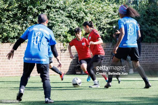 For Refugee week the Afghan National Development Squad - Girl Power and Comfort Angels play against the cross-party UK Women's Parliamentary Football...