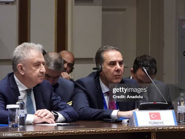 Turkish officials attend as Kanat Tumysh Deputy Minister of Foreign Affairs of the Republic of Kazakhstan announces the joint final declaration of...