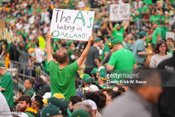 Oakland Athletics fans hold signs vs Tampa Bay Rays during a reverse boycott at the Oakland Coliseum. Oakland, CA 6/13/2023 CREDIT: Erick W. Rasco