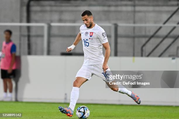 David Hancko of Slovakia controls the Ball during the UEFA EURO 2024 qualifying round group J match between Liechtenstein and Slovakia at Rheinpark...