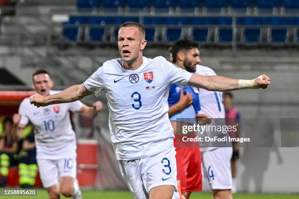 Denis Vavro of Slovakia celebrates after scoring his team's first goal during the UEFA EURO 2024 qualifying round group J match between Liechtenstein...