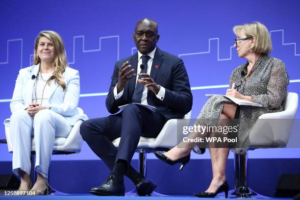 Horizon Capital chief executive officer Lenna Koszarny, International Finance Corporation managing director Makhtar Diop and British journalist and...