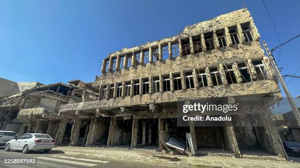 Renovation of some buildigns continue as daily life continues in Mosul six years after its recapture from Daesh despite the destruction by the...