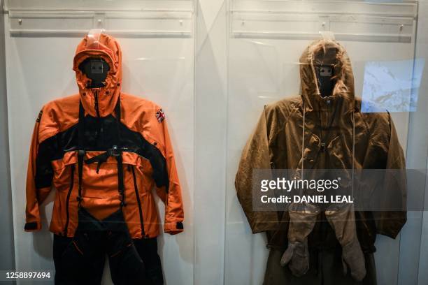 Photograph taken on June 19, 2023 shows the outfit used by scientists nowadays and before during their research in the Antarctic region, and...