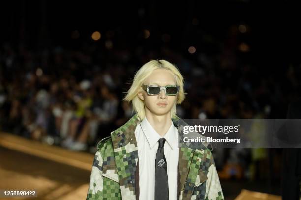 Model on the runway during the Louis Vuitton Spring-Summer 2024 Men's collection show at Pont Neuf bridge in Paris, France, on Monday, June 20, 2023....