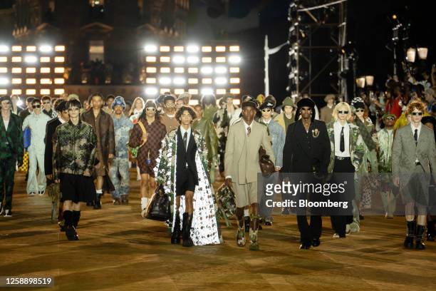 Models on the runway during the Louis Vuitton Spring-Summer 2024 Men's collection show at Pont Neuf bridge in Paris, France, on Monday, June 20,...