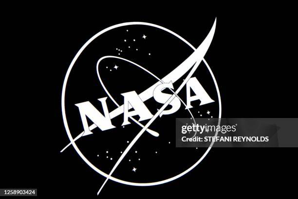 The NASA logo is displayed at the Earth Information Center exhibit, at NASA headquarters in Washington, DC, on June 21, 2023. NASA's Earth...