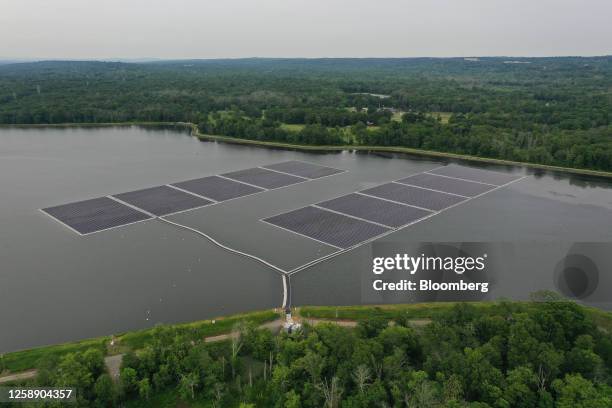 Floating solar panels on the Canoe Brook reservoir in Short Hills, New Jersey, US, on Monday, June 19, 2023. The new floating solar array, owned and...