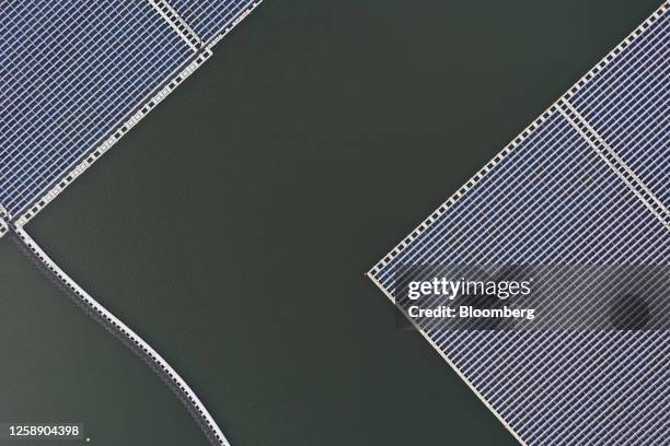 Floating solar panels on the Canoe Brook reservoir in Short Hills, New Jersey, US, on Monday, June 19, 2023. The new floating solar array, owned and...