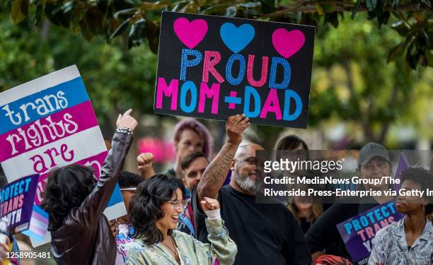 Riverside, CA Marchers cheer for parents of LGBTQ children during the Queer & Trans Youth Autonomy March in Riverside on Friday, March 31, 2023.