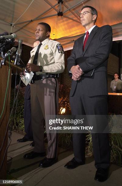 Montgomery County Chief of Police Charles Moose, with FBI Special Agent in Charge Gary Bald, announces the issuing of a warrant for the arrest of...