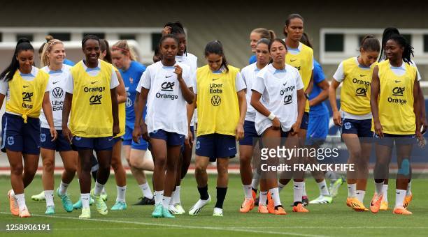 France's women's team players gather during a training session in Clairefontaine-en-Yvelines, on June 21 as part of the team's preparation for the...