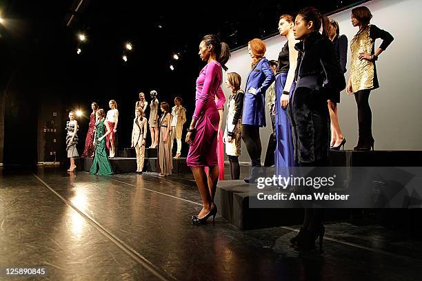 Models pose during the Yuna Yang Fall 2011 presentation during Mercedes-Benz Fashion Week at The Alvin Ailey Citigroup Theater on February 13, 2011...