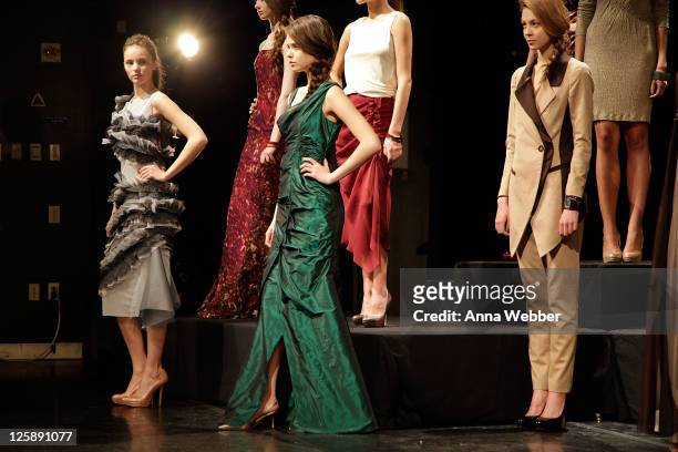 Models pose during the Yuna Yang Fall 2011 presentation during Mercedes-Benz Fashion Week at The Alvin Ailey Citigroup Theater on February 13, 2011...