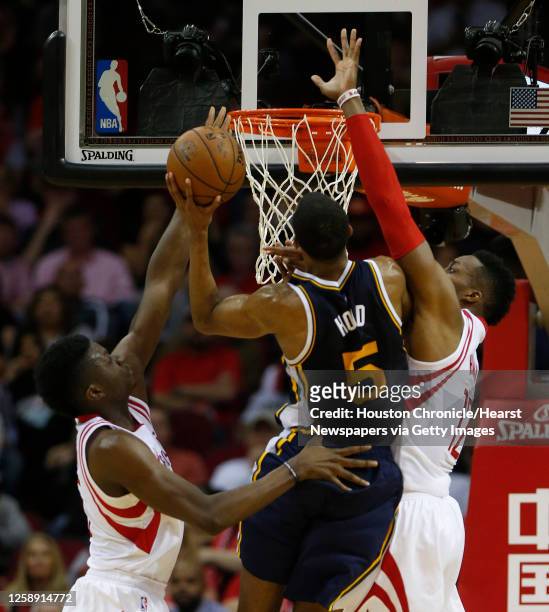 Houston Rockets center Dwight Howard and forward Clint Capela defend the basket against Utah Jazz guard Rodney Hood during the second half of an NBA...