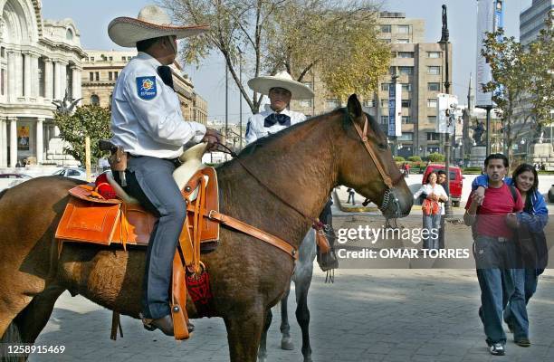 New mounted Mexican police officers patrol the Alameda Central in Mexico City's historic district 09 December, 2002. The new police squad, part of...