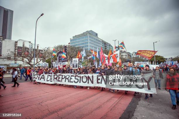 Protesters march with flags and a banner in support of the people of Jujuy during the demonstration. Protests in Jujuy province have erupted in...