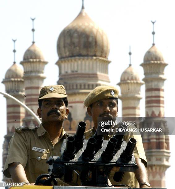 Indian policemen man a water cannon during a demonstration in Madras, 06 December 2003, on the 11th anniversary of the demolition by Hindu radicals...