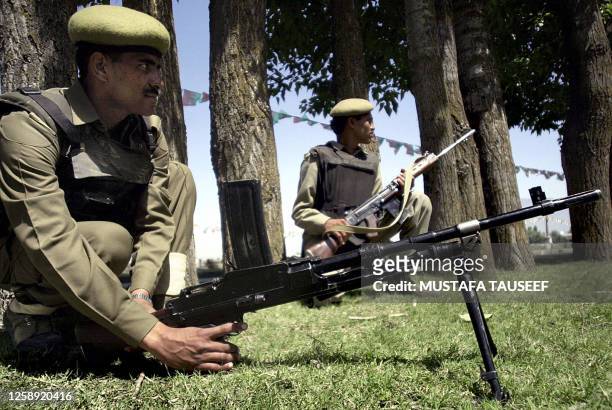 Indian Central Reserve Police Force personnels stand guard in Srinagar, 30 May 2003. Security was beefed up in Kashmir as leaders of India's main...