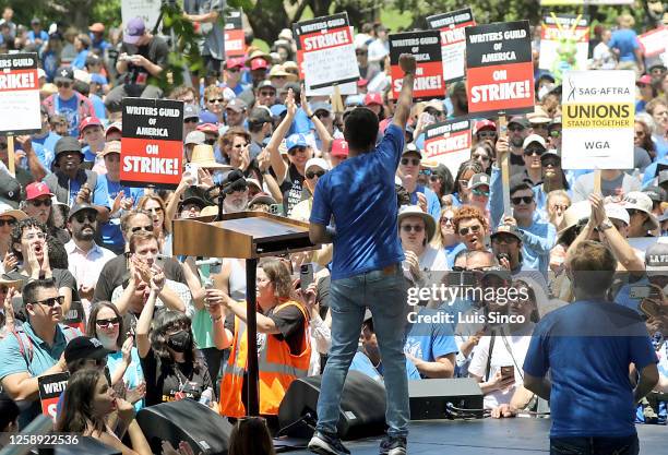 Los Angeles, CA - Hundreds of striking members of the Writers Guild of America rally at the La Brea Tar Pits in Los Angeles on Wednesday, June 21,...