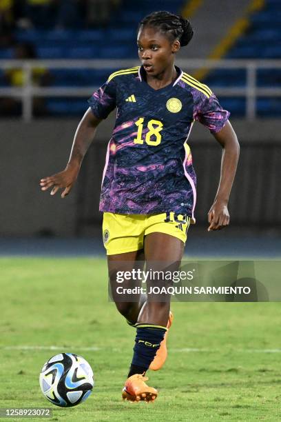 Colombia's forward Linda Caicedo controls the ball during the friendly football match between Colombia and Panama, ahead of the upcoming FIFA Women's...