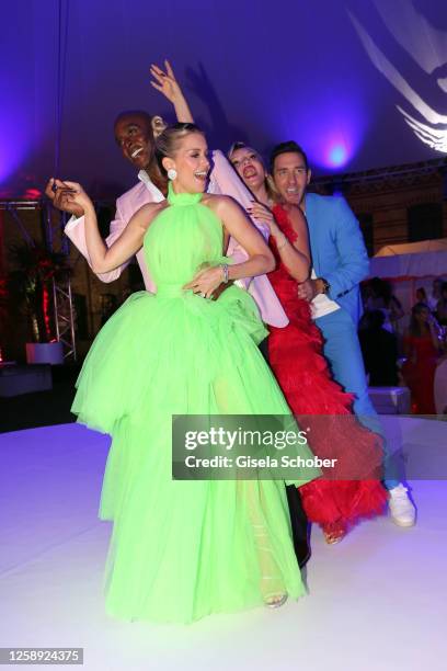 Bruce Darnell and Sylvie Meis, Evelyn Burdecki and Marcel Remus dance during the "Raffaello Summer Day" at KPM Hotel & Residences on June 21, 2023 in...