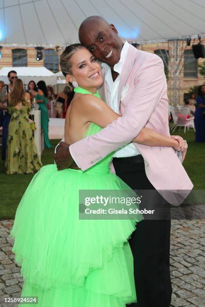 Sylvie Meis and Bruce Darnell during the "Raffaello Summer Day" at KPM Hotel & Residences on June 21, 2023 in Berlin, Germany.
