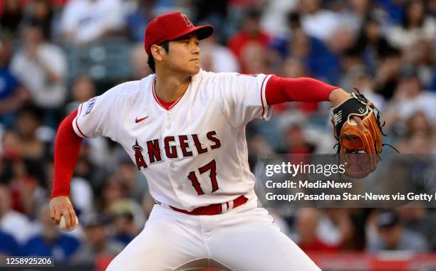 Anaheim, CA Starting pitcher Shohei Ohtani of the Los Angeles Angels throws to the plate against the Los Angeles Dodgers in the first inning of a...