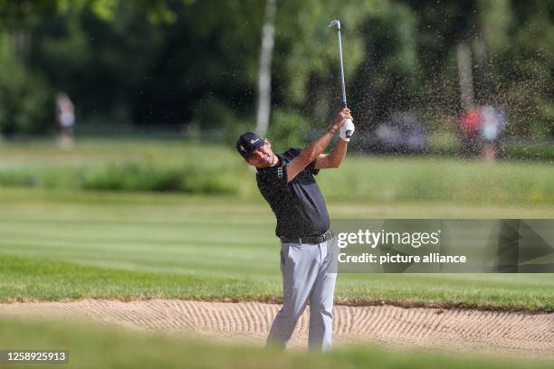 June 2023, Bavaria, Munich: Golf: European Tour - International Open, singles, men, 1st round at Golfclub München Eichenried. Golfer Felipe Aguilar...