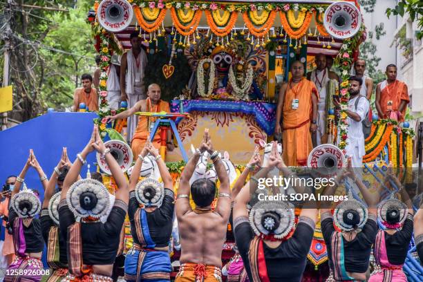 Devotees dance during the festival procession. The International Society for Krishna Consciousness community of Kolkata celebrates the annual Rath...