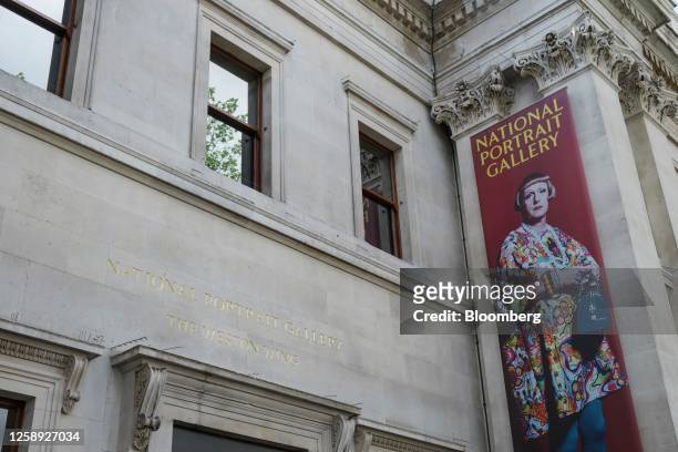 Banner featuring artist Grayson Perry at the north facade of the National Portrait Gallery in London, UK, on Monday, June 19, 2023. After three years...