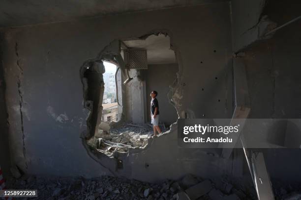 Boy inspect Palestinian prisoner Kamal Jouri's house demolished by Israeli forces in Nablus, West Bank on June 22, 2023.